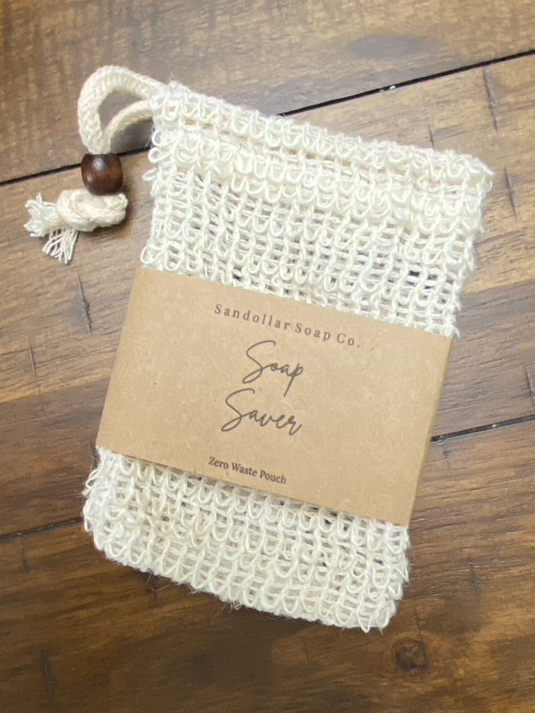 A white bag made of sisal used to store bar soap.